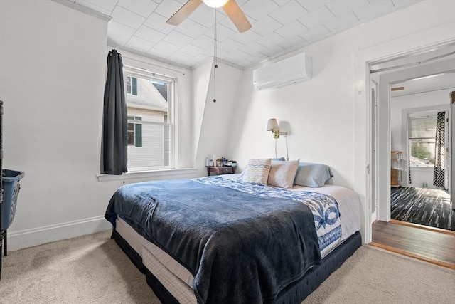 73 Lincoln Ave, Saugus, MA 01906 - carpeted bedroom with a wall mounted AC, baseboards, and a ceiling fan