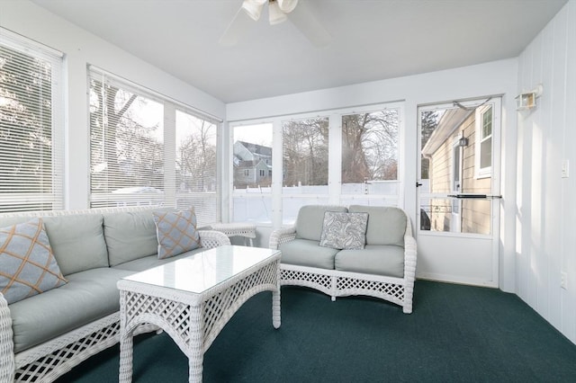 sunroom / solarium with ceiling fan