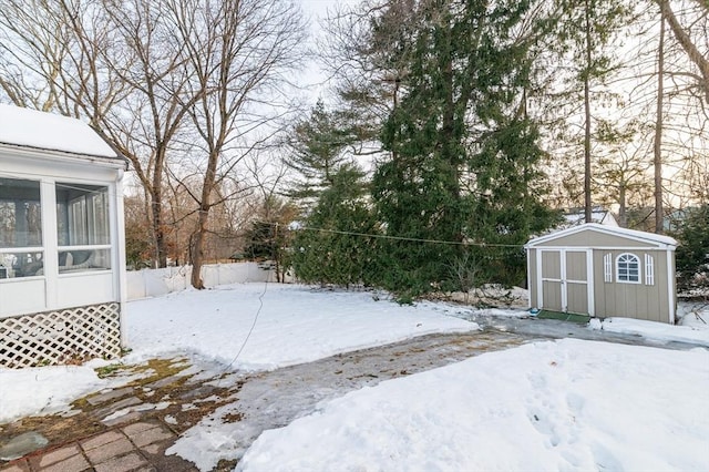 view of yard layered in snow