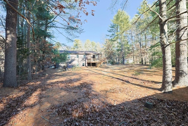 view of yard with a deck