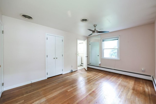 33 Page Rd, North Attleboro, MA 02760 - unfurnished bedroom with baseboard heating, wood finished floors, and a ceiling fan