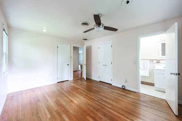 33 Page Rd, North Attleboro, MA 02760 - unfurnished bedroom with light wood-type flooring, ensuite bathroom, and a ceiling fan