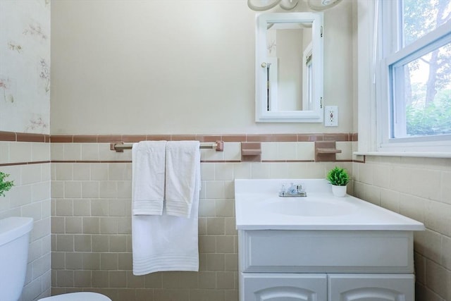 33 Page Rd, North Attleboro, MA 02760 - half bath with tile walls, a wainscoted wall, and vanity