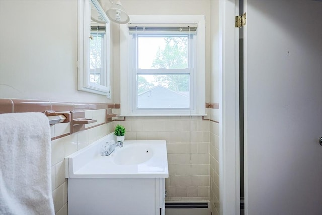 33 Page Rd, North Attleboro, MA 02760 - bathroom with vanity, a wainscoted wall, and tile walls
