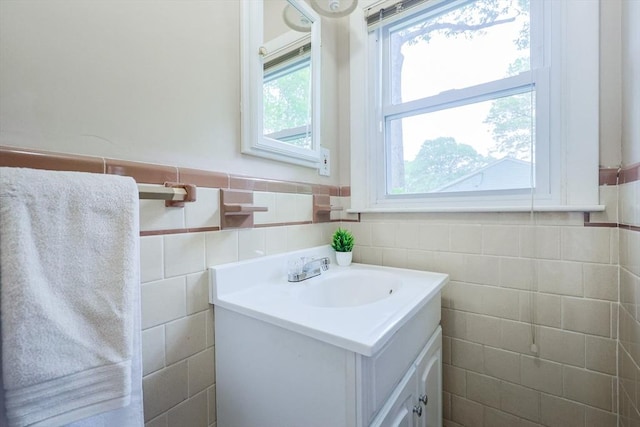 33 Page Rd, North Attleboro, MA 02760 - bathroom with tile walls, vanity, and wainscoting