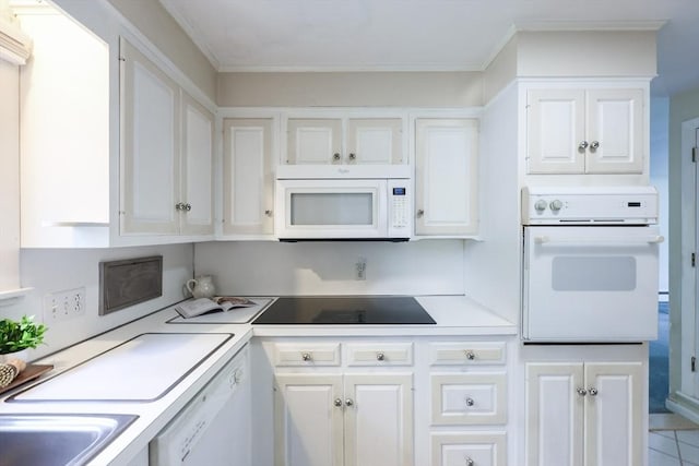33 Page Rd, North Attleboro, MA 02760 - kitchen featuring white appliances, white cabinets, light countertops, and ornamental molding