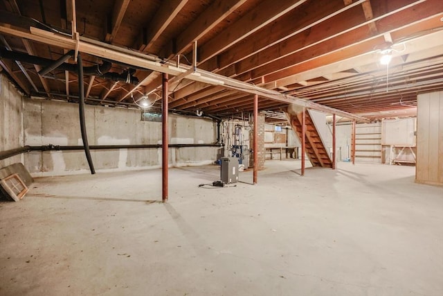33 Page Rd, North Attleboro, MA 02760 - unfinished basement with stairs and a heating unit
