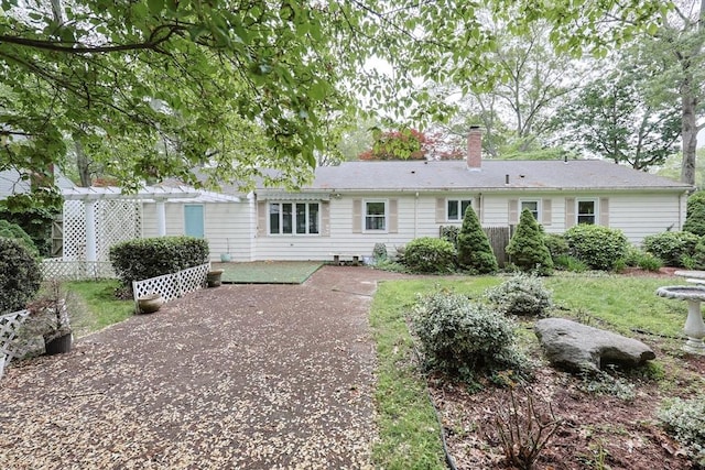 33 Page Rd, North Attleboro, MA 02760 - back of property with a patio and a chimney