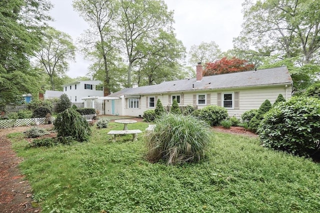 33 Page Rd, North Attleboro, MA 02760 - rear view of property featuring a chimney
