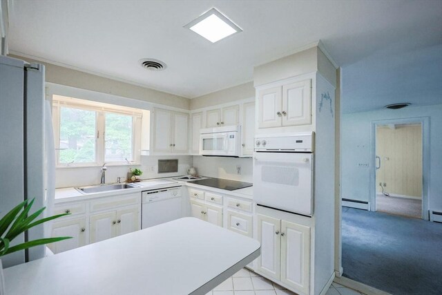 33 Page Rd, North Attleboro, MA 02760 - kitchen featuring white appliances, white cabinets, light countertops, and baseboard heating