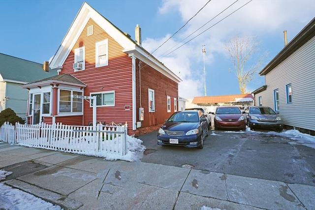 view of home's exterior with cooling unit