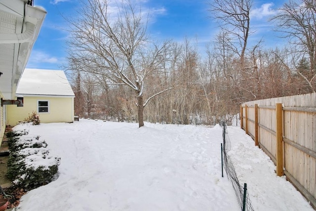 view of yard covered in snow