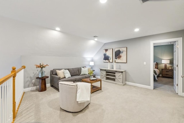 living room featuring recessed lighting, baseboards, lofted ceiling, and light carpet