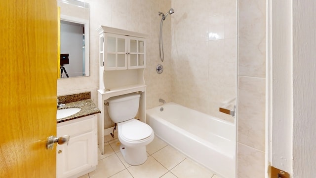 full bathroom with tile patterned flooring, vanity, toilet, and  shower combination