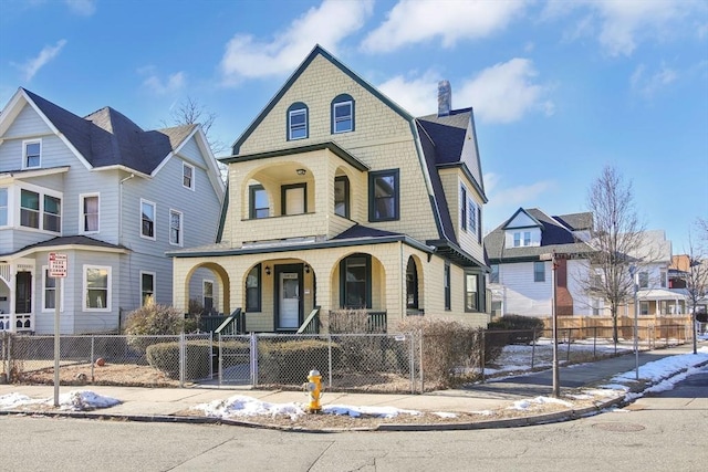 view of front of property featuring covered porch