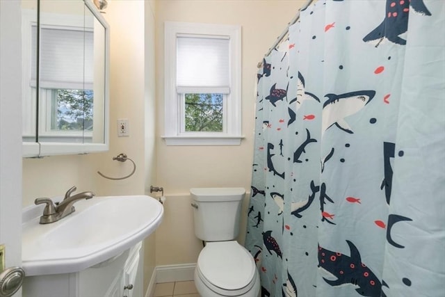 29 Balcomb St Unit 29, Salem, MA 01970 - bathroom featuring toilet, tile patterned floors, baseboards, a sink, and a shower with curtain