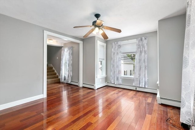 29 Balcomb St Unit 29, Salem, MA 01970 - empty room featuring hardwood / wood-style flooring, a ceiling fan, stairs, and baseboards