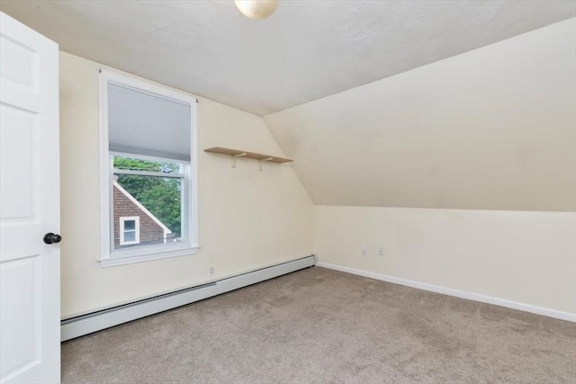 29 Balcomb St Unit 29, Salem, MA 01970 - additional living space featuring a baseboard radiator, carpet floors, vaulted ceiling, and baseboards