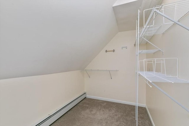 29 Balcomb St Unit 29, Salem, MA 01970 - spacious closet featuring vaulted ceiling, a baseboard radiator, and carpet floors