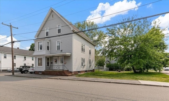 29 Balcomb St Unit 29, Salem, MA 01970 - view of front facade featuring a porch and a front yard