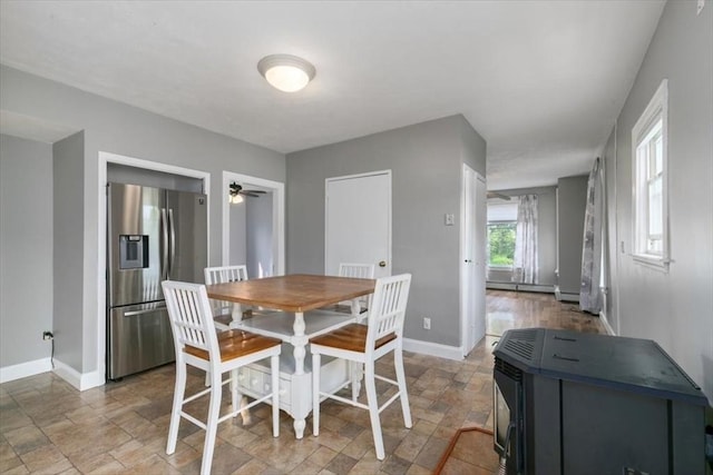 29 Balcomb St Unit 29, Salem, MA 01970 - dining area with stone finish floors, baseboards, a baseboard radiator, and a ceiling fan