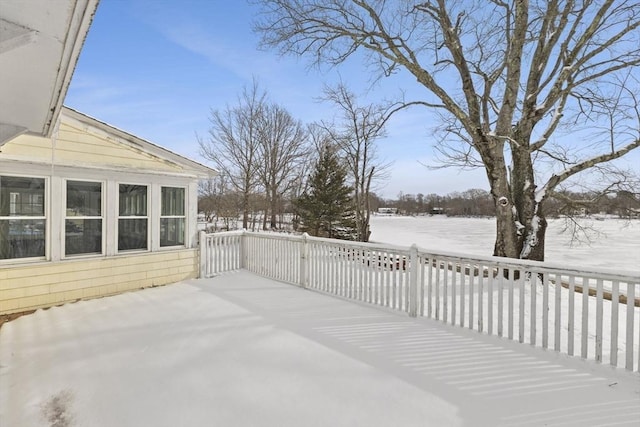 view of snow covered deck