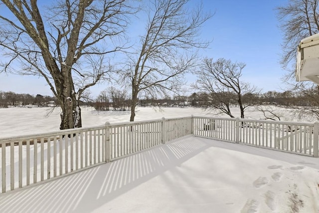 view of snow covered deck