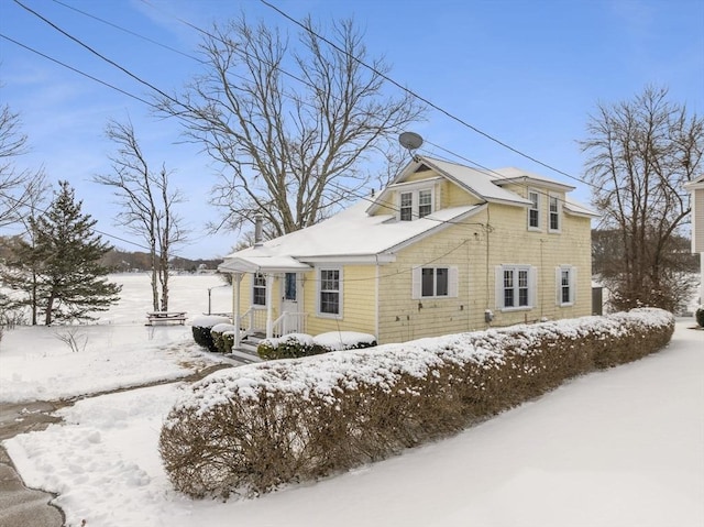 view of snow covered property