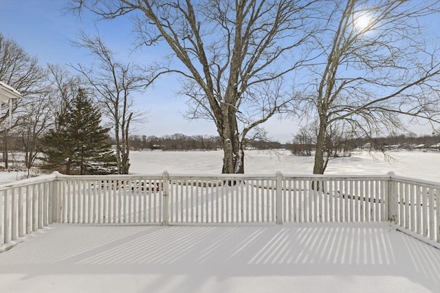 view of snow covered deck