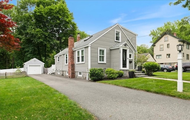 38 Pasho St, Andover, MA 01810 - bungalow-style house featuring a chimney, an outbuilding, a garage, driveway, and a shingled roof