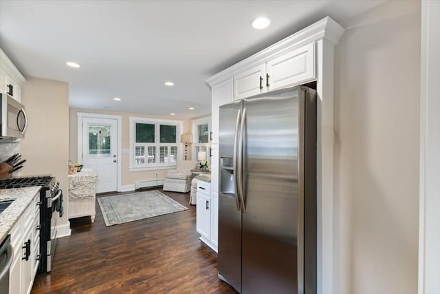 38 Pasho St, Andover, MA 01810 - kitchen featuring stainless steel appliances, light stone counters, white cabinetry, dark wood finished floors, and recessed lighting