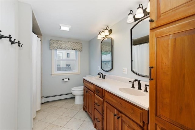 38 Pasho St, Andover, MA 01810 - full bath with a baseboard heating unit, double vanity, and tile patterned flooring
