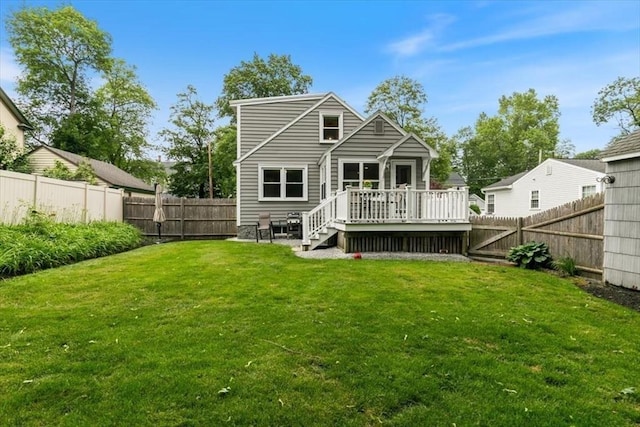 38 Pasho St, Andover, MA 01810 - rear view of property with a wooden deck and a fenced backyard