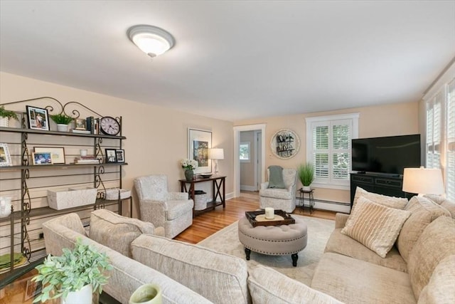 38 Pasho St, Andover, MA 01810 - living area featuring baseboard heating and wood finished floors