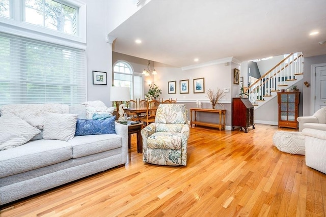 38 Gold Leaf, Mashpee, MA 02649 - living room featuring stairway, wood finished floors, a chandelier, ornamental molding, and recessed lighting