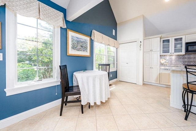 38 Gold Leaf, Mashpee, MA 02649 - dining space featuring light tile patterned floors and high vaulted ceiling