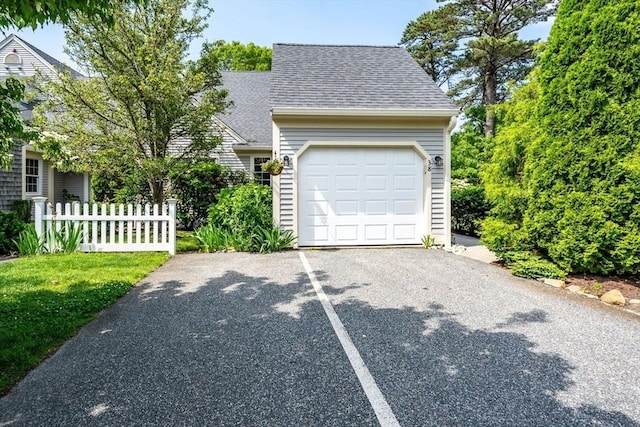 38 Gold Leaf, Mashpee, MA 02649 - garage featuring asphalt driveway