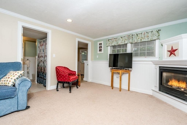 38 Gold Leaf, Mashpee, MA 02649 - carpeted living room with a glass covered fireplace, ornamental molding, and recessed lighting