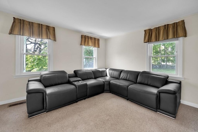living room with light colored carpet and baseboards