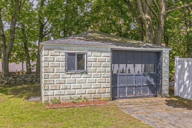 view of outbuilding with an outdoor structure and a garage