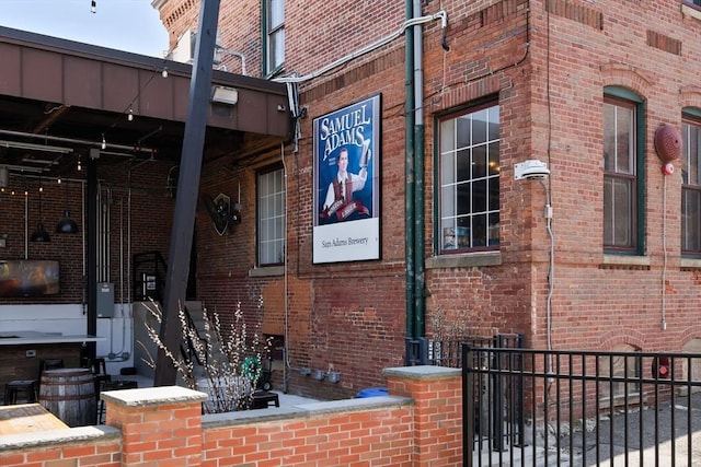 view of property exterior featuring brick siding