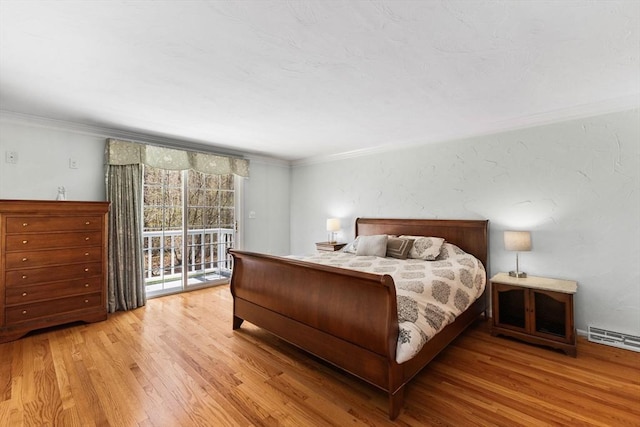 bedroom featuring crown molding, access to exterior, light wood-style flooring, and a baseboard radiator