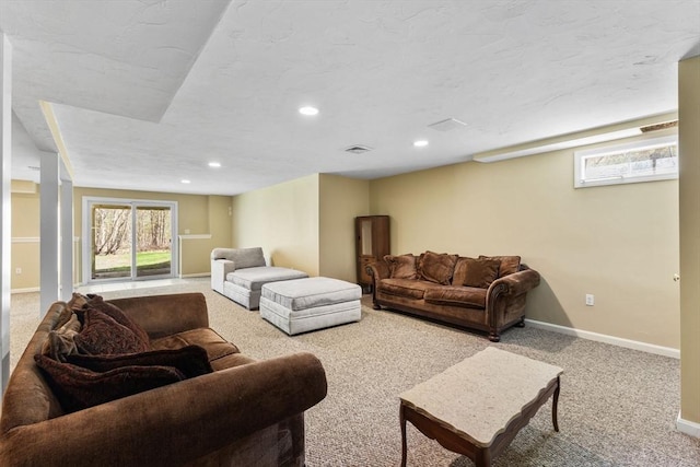living area featuring carpet floors, recessed lighting, baseboards, and visible vents