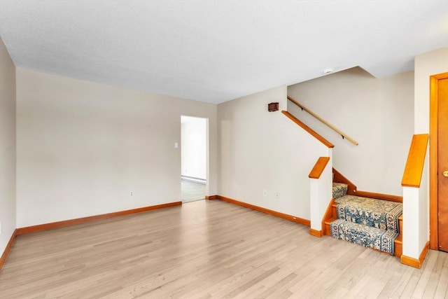 unfurnished living room featuring light hardwood / wood-style floors