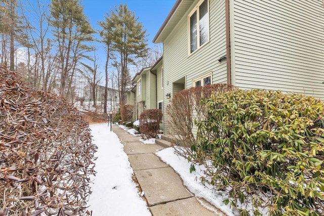 view of snow covered property