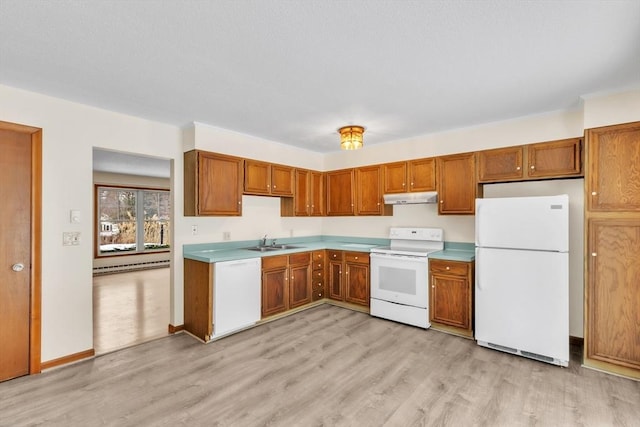 kitchen featuring white appliances, sink, and light wood-type flooring