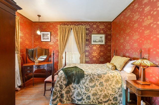 bedroom featuring wood-type flooring