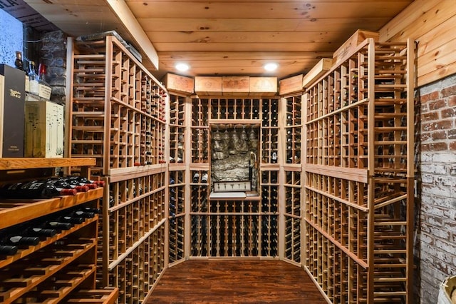 wine area with hardwood / wood-style floors and wooden ceiling