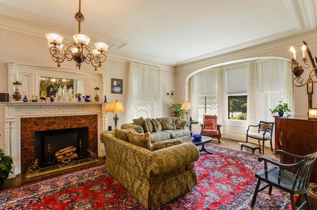 living room with crown molding and a notable chandelier