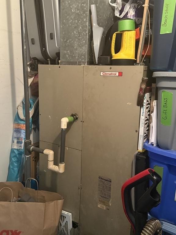 221 Oak St Unit 2-23, Brockton, MA 02301 - utility room with heating unit
